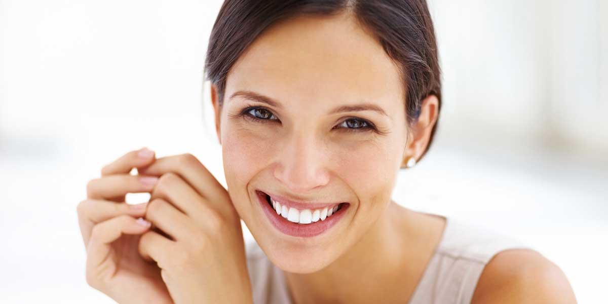 Woman Smiling After Smile Makeover