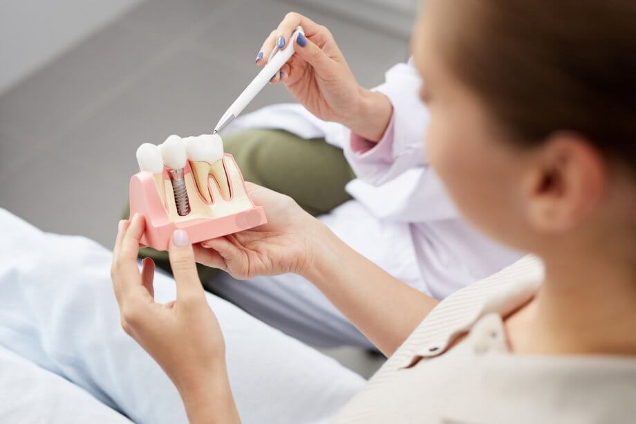 doctor explaining tooth implants